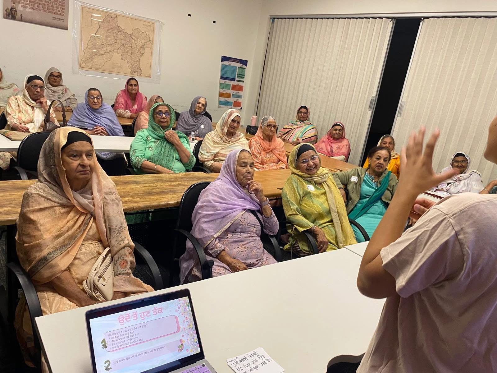 Senior community members participating in a learning program